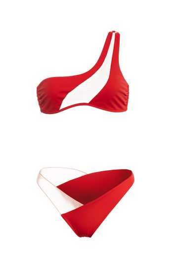 Pharos Bikini 32 Close up Pharos Bikini Luxe white one shoulder top with sheer tulle panel and gold bead necklace emphasizing feminine curves gost red front