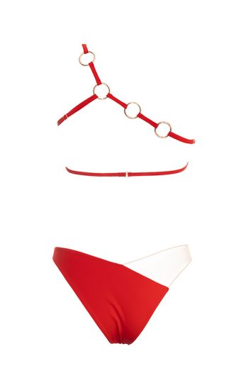 Pharos Bikini 33 Close up Pharos Bikini Luxe white one shoulder top with sheer tulle panel and gold bead necklace emphasizing feminine curves gost red retro