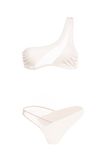 Pharos Bikini 34 Close up Pharos Bikini Luxe white one shoulder top with sheer tulle panel and gold bead necklace emphasizing feminine curves gost white front