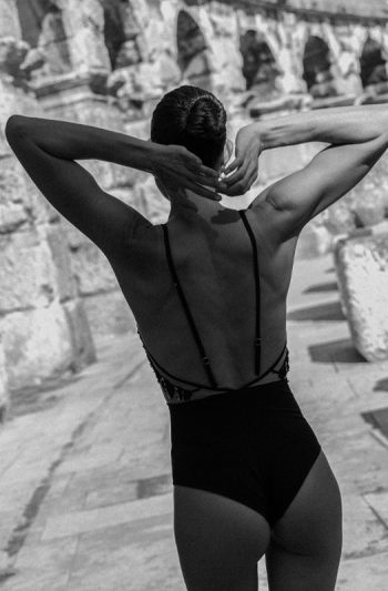 Nadia One-Piece 17 Moorea Swim Nadia in ivory handcrafted glass beads on chiffon embroidered tulle bodice shaping interlock bottom contemplative black and white pose 2